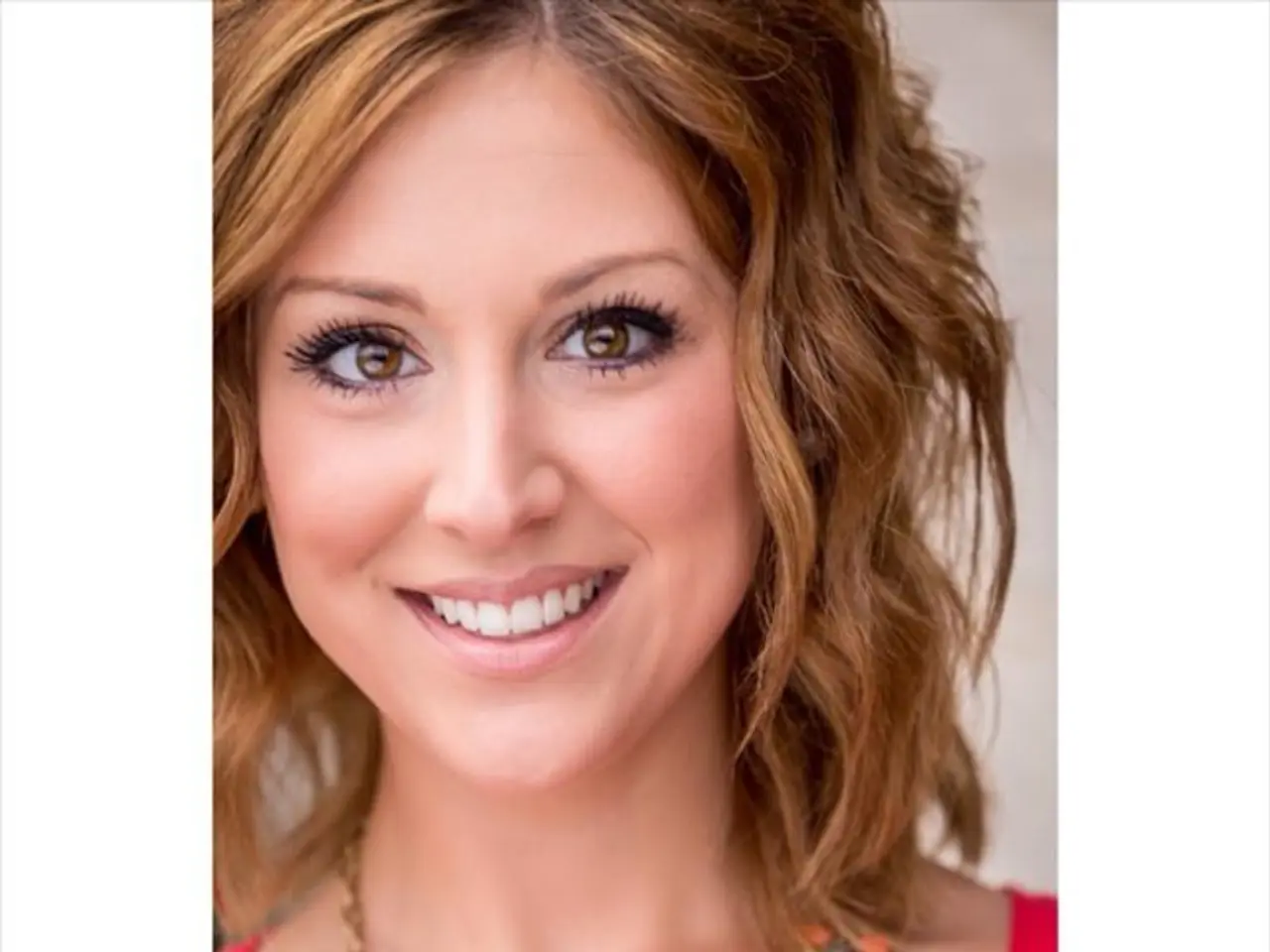 In this image I can see a woman posing for the pic wearing red dress. In the right bottom corner I...