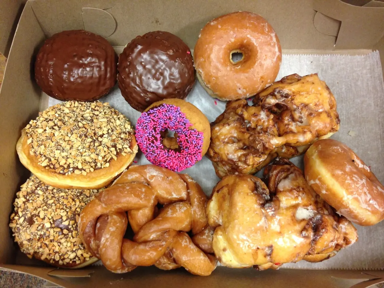 In this image there is a box, in that box there are sweets.