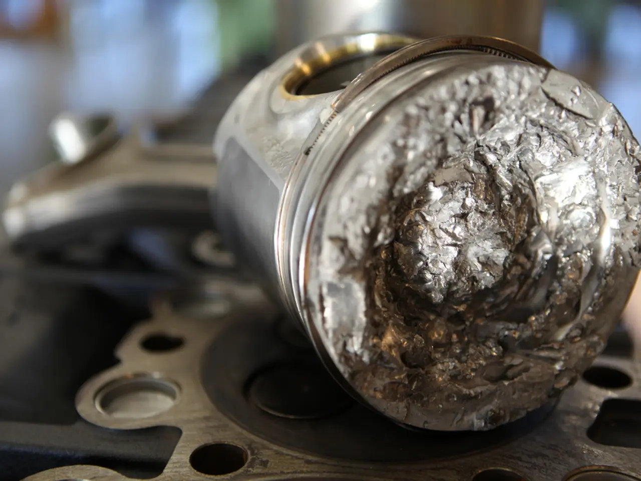 In the picture we can see a metal on the tool, and the background is not clear.