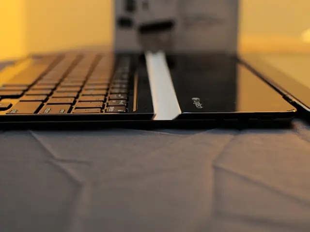 Tech Giant Microsoft Promotes AI-Powered PC Purchase, Apple Counters with a MacBook for $599 Offer