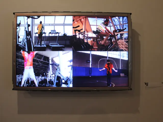 In this image we can see a television on the wall. On the screen of the television, we can see...