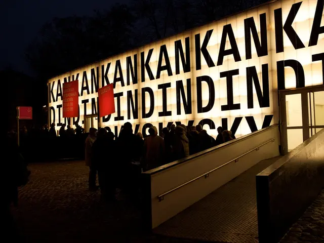 At the center of the image there are people standing in front of the building. There is a door,...