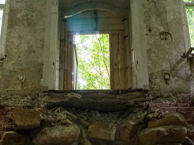 In this picture there is a house. To the below there are rocks and bricks. To the below right...